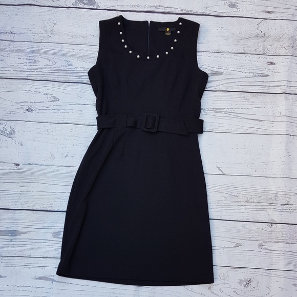 Dresses & Skirts - Dress with pearls accent around neckline.